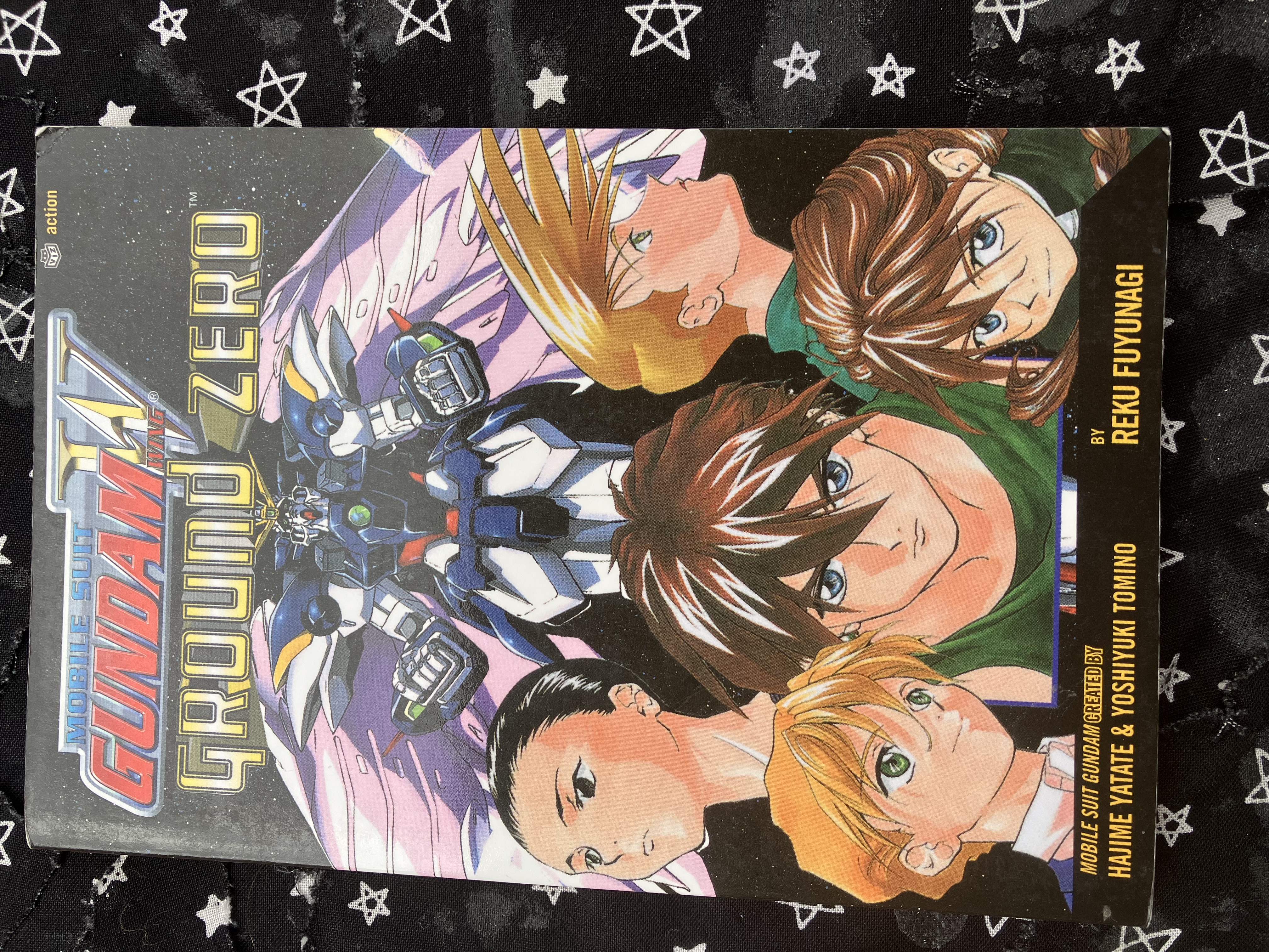 Front of Gundam wing ground zero with the wing boys and wing zero on the cover.